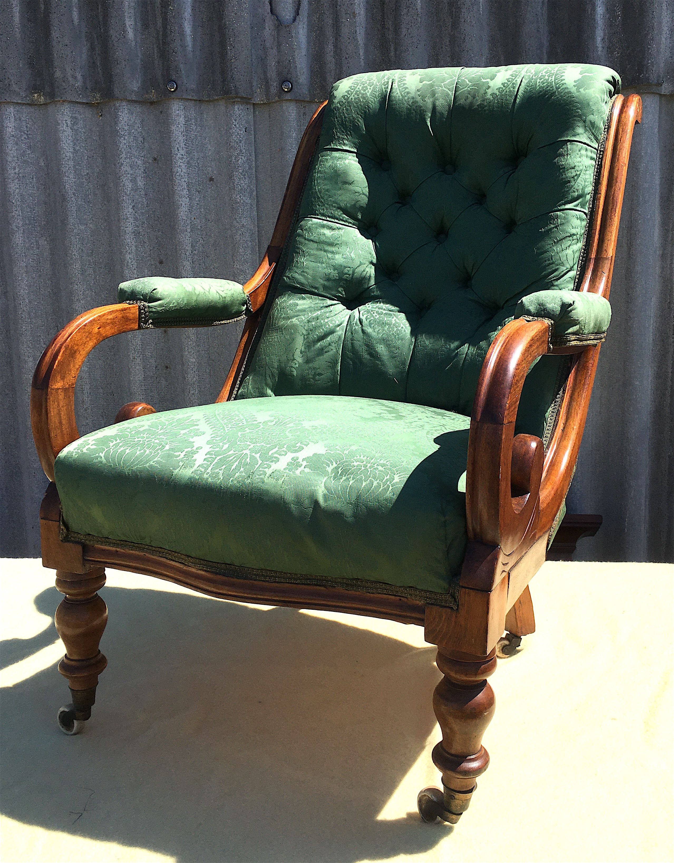 A mid Victorian upholstered mahogany armchair, width 66cm, depth 70cm, height 94cm